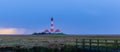 Panorama of Lighthouse Westerheversand Germany in Evening Royalty Free Stock Photo
