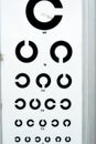 Landolt C broken ring optotypes or Japanese vision test in various sizes and orientations, an eye chart used for testing vision Royalty Free Stock Photo
