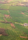 Lands aerial view. Mosaic golden fields and green meadows