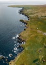 Landscape from above of Gatklettur basalt rock on the Atlantic coast of Arnarstapi.