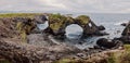 Landscape from above of Gatklettur basalt rock on the Atlantic coast of Arnarstapi.