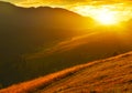 Landscape with abrupt slopes in highland at sunrise