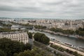 Moody view of Seine river and cityscape in Paris, France