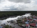 aerial view of rural fishing village by the river bank. Royalty Free Stock Photo