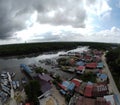 aerial view of rural fishing village by the river bank. Royalty Free Stock Photo