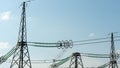 Landscape against the sky metal poles power lines with wires. Electricity and Energy Transmission Concept