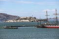 Landscape of Alcatraz Island and sailing ships in San Francisco, California