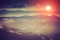 Landscape of amazing evening winter in mountains. Fantastic evening glowing by sunlight. Royalty Free Stock Photo
