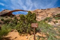 Landscape Arch along the Devils Garden trail in Arches National Park Utah, warning sign for hikers not to go beyond the fence Royalty Free Stock Photo