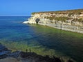 arch shaped rock formation in the sea