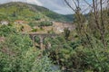 Landscape with arched bridge over the ZÃªzere river in aerial view and BouÃ§Ã£ dam, PORTUGAL Royalty Free Stock Photo