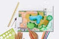 Landscape architect student designing backyard garden and pool plan for villa