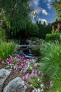 Landscape architecture with water feature and flowers Royalty Free Stock Photo