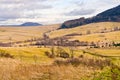 Landscape with autumnal meadows and hills Royalty Free Stock Photo