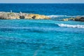 Landscape with balanced rocks, stones on a rocky coral pier. Turquiose blue Caribbean sea water. Riviera Maya, Cancun, Mexico. Royalty Free Stock Photo