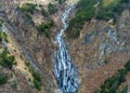 Landscape of the Balea waterfall in the Fagaras mountains in late autumn Royalty Free Stock Photo