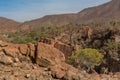 Landscape on the banks of the Kunene River, the border river between Namibia and Angola Royalty Free Stock Photo
