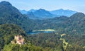 Landscape of Bavarian Alps with Hohenschwangau Castle, Germany. Aerial scenic view of beautiful castle and Schwansee lake Royalty Free Stock Photo