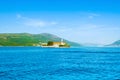 Landscape of the Bay of Kotor coastline with view to The Our Lady of Mercy Royalty Free Stock Photo