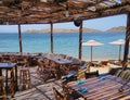 Holiday scene at a beach bar on the charming Greek island of Kea.