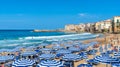 Landscape with beach and medieval Cefalu town