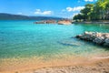 Turquoise small bay and beach in Krk, main town at Krk island, Croatia