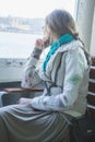 landscape beautiful girl dressed in boho style, riding a ferry in Istanbul Royalty Free Stock Photo