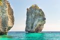 Rocky tropical island in blue sea