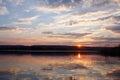 Landscape of beautiful sunset in spring season over lake. Royalty Free Stock Photo