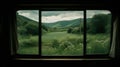 Landscape beautiful view out of window from riding train among summer nature with hills Royalty Free Stock Photo