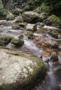 Landscape of Becky Falls waterfall in Dartmoor National Park Eng