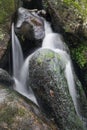 Landscape of Becky Falls waterfall in Dartmoor National Park Eng