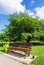 Landscape with a bench in a recreation park Royalty Free Stock Photo