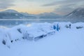landscape with benches snow and mountains Royalty Free Stock Photo