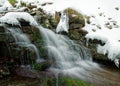 Landscape from Beskydy mountains, mountain creek and waterfall Bystry, Winter forest with waterfall and a lot of white frost snow Royalty Free Stock Photo