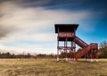 Landscape with big watching tower. Long exposure photo. Royalty Free Stock Photo