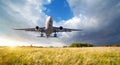 Landscape with big white passenger airplane Royalty Free Stock Photo