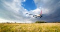 Landscape with big white passenger airplane Royalty Free Stock Photo