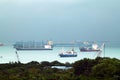 Landscape from bird view of Cargo ships entering one of the busiest ports in the world, Singapore. Royalty Free Stock Photo