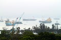 Landscape from bird view of Cargo ships entering one of the busiest ports in the world, Singapore Royalty Free Stock Photo