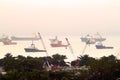 Landscape from bird view of Cargo ships entering one of the busiest ports in the world, Singapore. Royalty Free Stock Photo