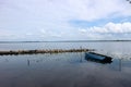 Landscape with blue fishing boat on the lake Seliger, Ostashkov, Russia Royalty Free Stock Photo