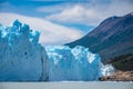 Landscape of the blue glacier and mountains in the afternoon. Shevelev. Royalty Free Stock Photo