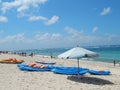 Landscape of blue Kayaks and white big umbrella Royalty Free Stock Photo