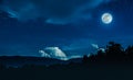 Landscape of blue night sky with many stars and beautiful full moon Royalty Free Stock Photo