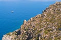 View on rock coastline and ocean from hiking trail on Greek island Telendos.