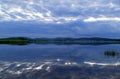 Landscape in blue. Reflection of the evening sky in the water. River Iset. Ural. Sverdlovsk region, Russia