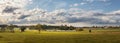 Landscape with blue sky and clouds - panorama of rural countryside with pond Royalty Free Stock Photo