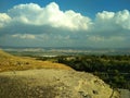 Landscape. Blue Sky with white clouds. The mountains in the distance. Desktop Royalty Free Stock Photo