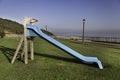 Landscape with blue slide